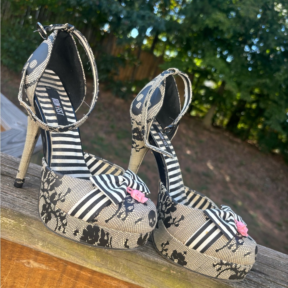 Iron Fist beautiful heels for a night out! Charm and skulls!